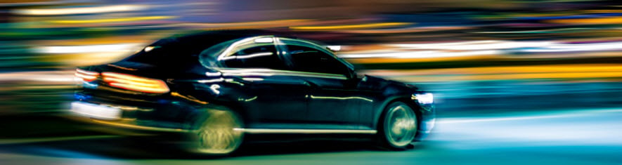 speeding car at night